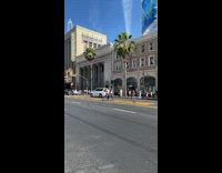 Man and woman tiktok dance middle of the street