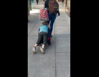 Collab WINY - Boy lay on luggage pulled by mom
