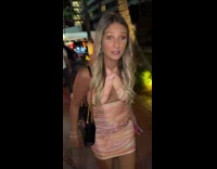 Woman in pink dress says to find a walk home 