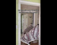 Guy approaches camera with cleaning supplies 