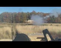 Brown tank shoot earth shake grass field