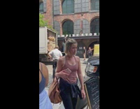 Driver of truck causing traffic argues with people 