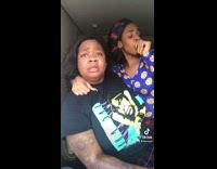 Lady holds grown daughter like baby 