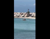 Woman bikini bend over at crystal kayak