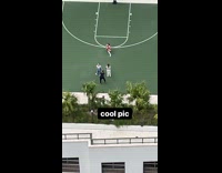 Woman black bikini basketball court rooftop friends