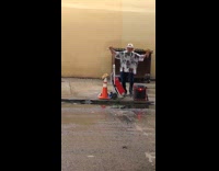 Guy sings and dances alone to Latin music with mic 