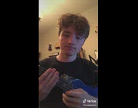 Collab BitchIG2 - Guy black shirt playing sounds on blue guitar