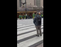 Group of people plays a game at the crosswalk 