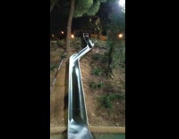 man with helmet backwards slide 