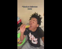 Man Talks while he Eats Candy Loot from Halloween