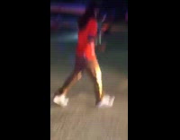 Guy does donuts on ATV on street, tips over and falls down