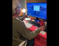 Man learning how to pay bills online 