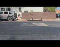 Girl no undershirt grey coat van scooter