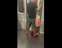 Man with target bag has trouble balancing