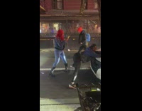 Woman dancing on road asks stranger to dance and then dances on him