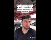 Black shirt guy runs across parking lot 