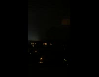 Lightning strike over apartment buildings