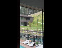 Man shirtless with blue cap pictures reflection