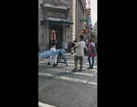 Girl briefly dances on new york cross walk 
