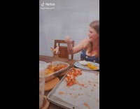 Collab BitchIG2 - Mom feeds dog bruschetta at dining table 