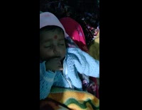 Baby wakes up smiles at girl 