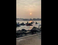 Collab winy - Men on Jet Ski Leaves Shore Together