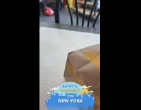 Woman face covered in white makeup powder paint at fast food place