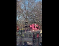 Party bus playing electronic music with people in park dancing