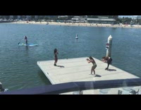 Girl cap shorts workout squats beach platform