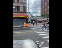 Trash stock on huge fire at sidewalk