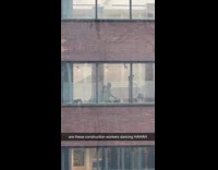 Collab WINY - Two construction worker dances across the building