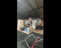 Guy swings metal pole lands tire gym 