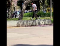 Guy falls off skateboard onto trash can