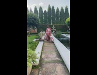 Woman walks in a red slit dress Part 3