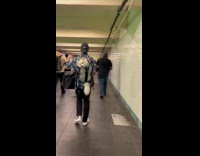 Chill dog enjoys ride in backpack carrier