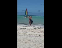Couple records videos at beach 
