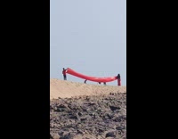 Woman long red dress sleeve beach assistant
