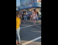 Woman floral top pictorial middle of the park