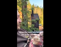 Baby look upset held by bearded dad