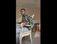 Guy rocks chair and almost falls 