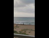 Man black top alone tiktok dance beach