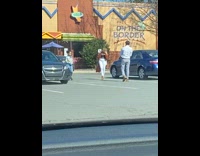 Girl poses outside restaurant 