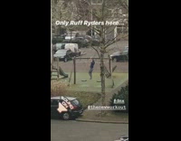 Guy uses swing set for pull ups 