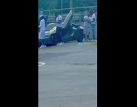 Guy step on stacked cash sports car