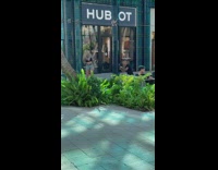 Blonde woman black bra dance outside store