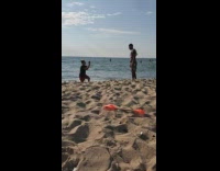 Man shirtless shades towel woman pictorial beach