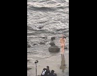 Three women poses for different beach photoshoot