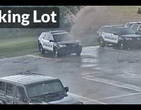 Police car gets hit by strong lightning