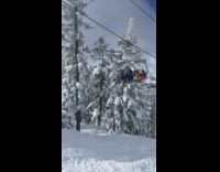 Guy drops phone in snow ski lift