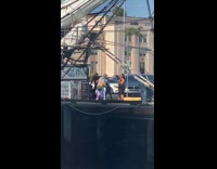 Guy dye shirt rap video posters chains